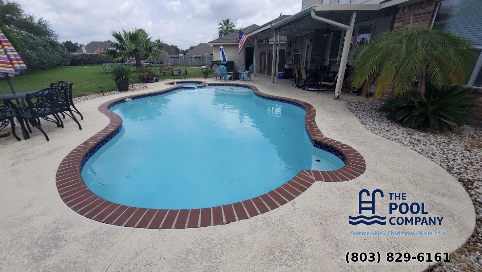Beautiful freeform pool with brick coping - The Pool Company Summerville SC