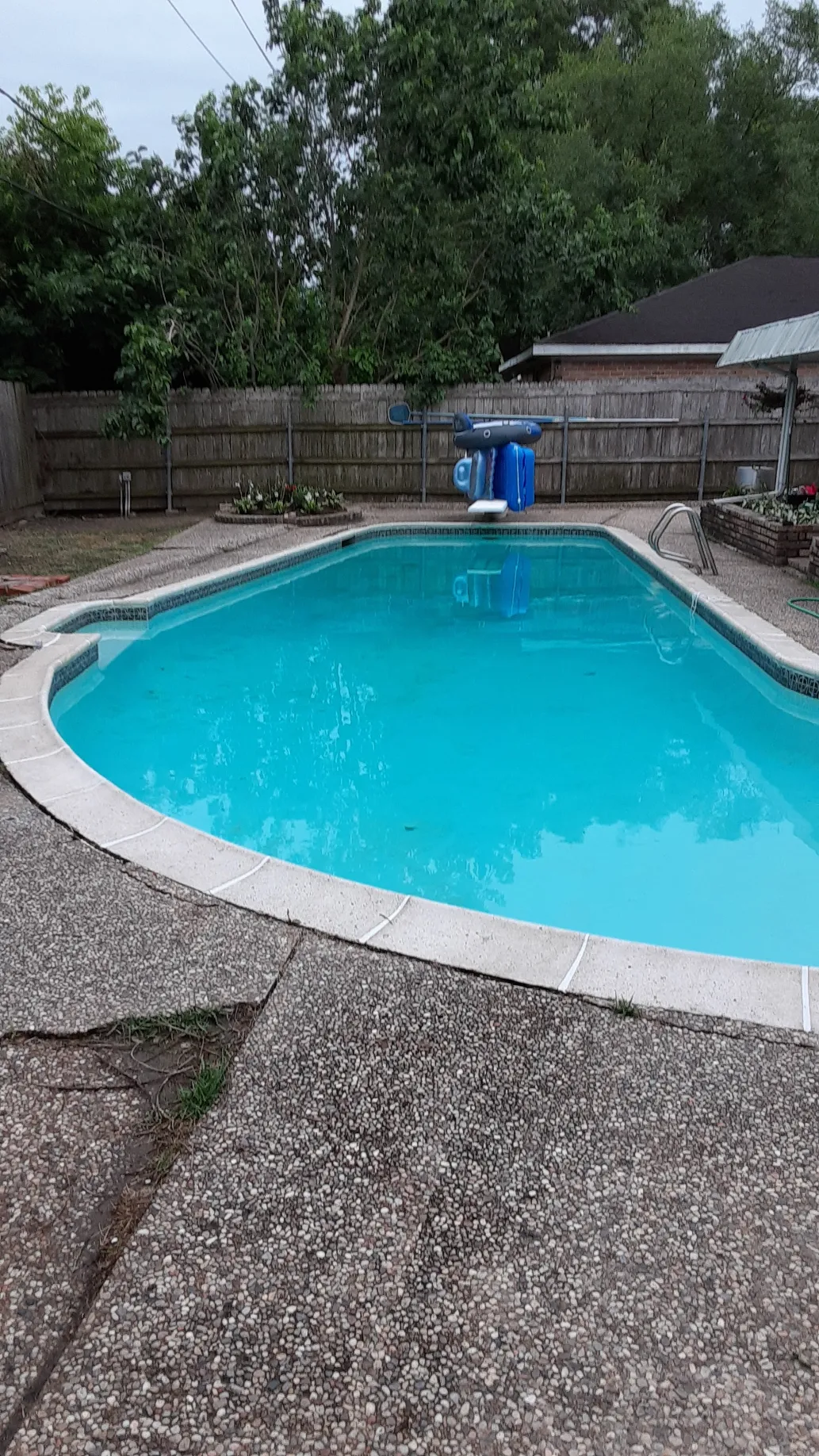 Above-ground pool cleaning and water treatment service